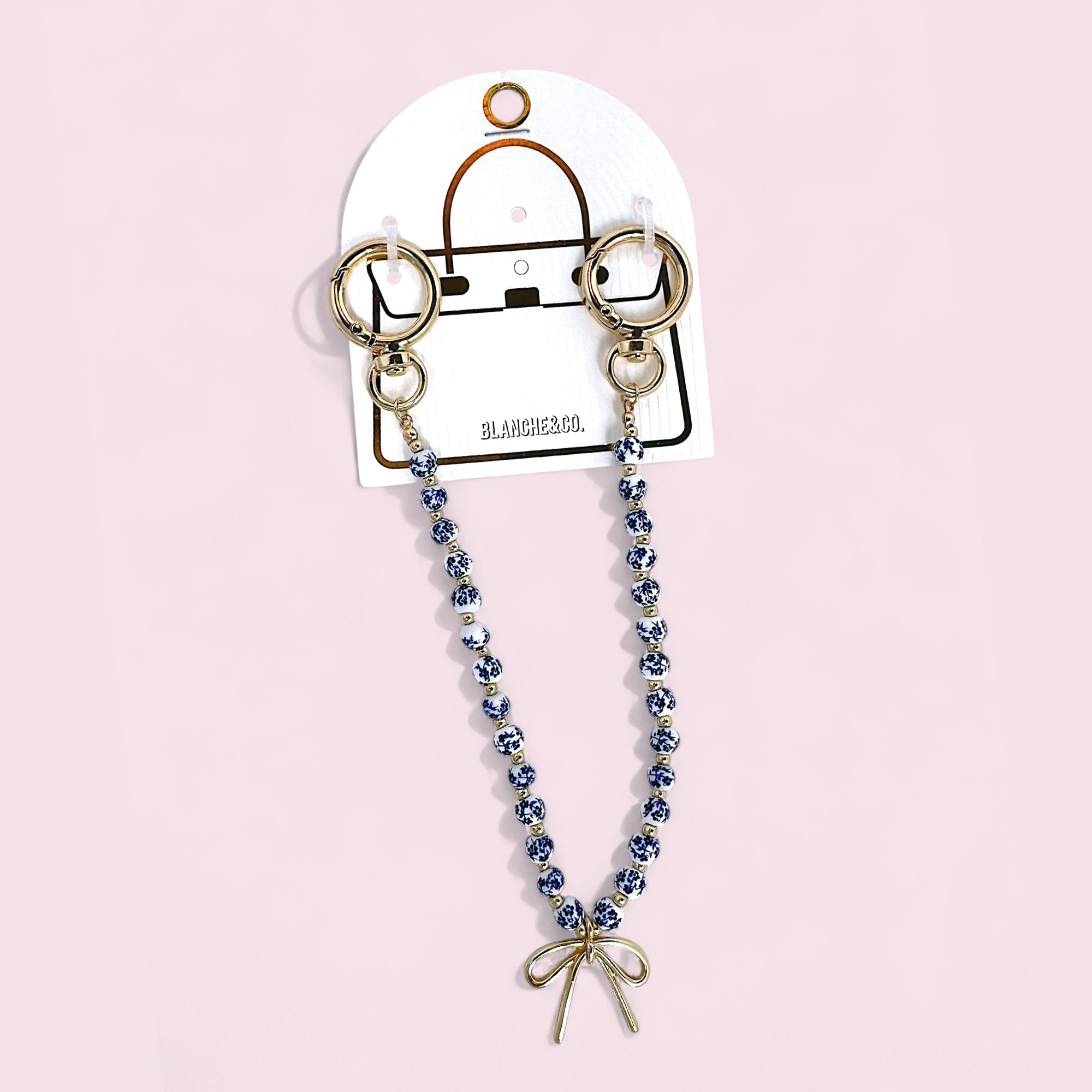 Blue & White Porcelain Bead Bag Charm – Gold Bow Accent